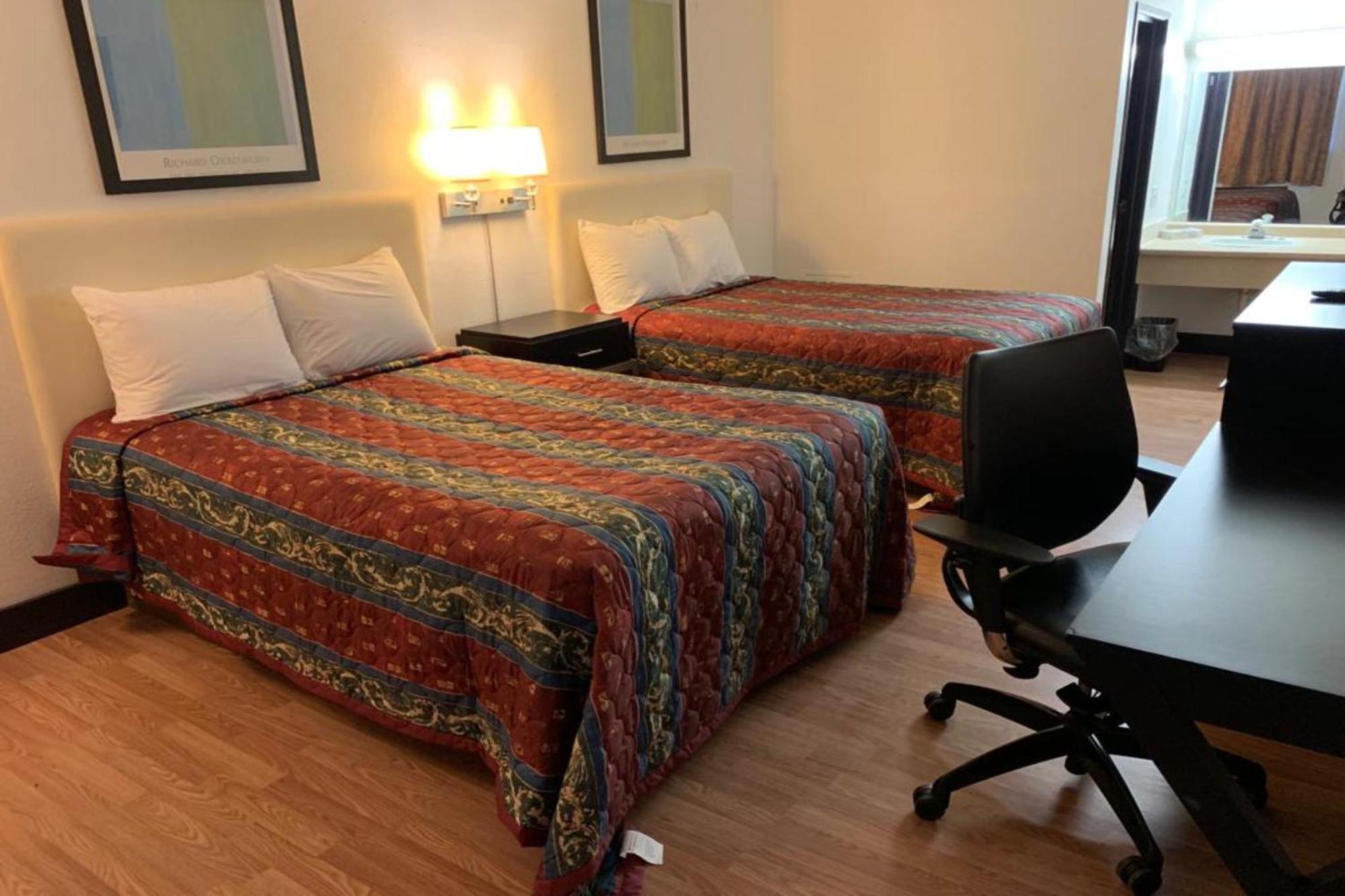 Economy Inn Of Holland Zewnętrze zdjęcie